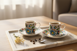 Folkstar Basia espresso cups filled with espresso on a marble tray with coffee beans and dried flowers