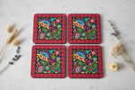 Folkstar Kraków folk cork coasters arranged in flat lay on marble surface
