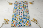 Folkstar Kashubian folk table runner flat lay on marble surface