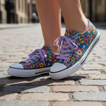 Folkstar Opole folk sneakers close-up on cobblestone street