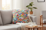 Folkstar Opole folk pillow on a light grey linen sofa in a cozy Scandinavian living room